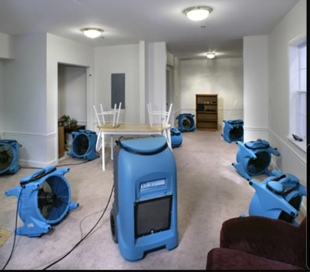 Air movers and dehumidifier setup for Water Damage Restoration in Asbury Lake